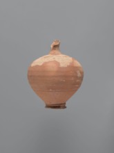 Jug, unknown Aswan workshop. Jug with a rounded rim, a narrow and upwardly flaring neck with a
