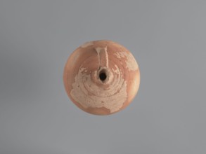 Jug, unknown Aswan workshop. Jug with a rounded rim, a narrow and upwardly flaring neck with a