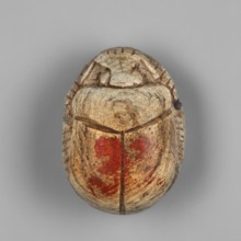 Scarab - a forgery? Scarab with a pseudo-inscription on the underside of the base. Traces of red