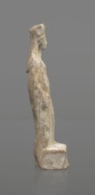 Female terracotta figurine of a standing woman, depicted frontally. Set on a small, hollow,