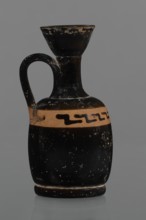 Black-finned aryballois lekythos. Large, ring-shaped foot. The body is rather squat, barrel-shaped