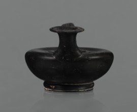 Black-finished askos, unknown Campanian workshop, black-finished pottery, askos, Campania Italy.