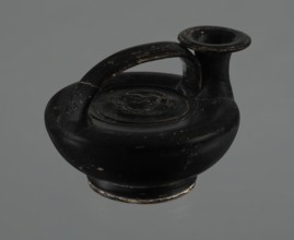 Black-finished askos, unknown Campanian workshop, black-finished pottery, askos, Campania Italy,