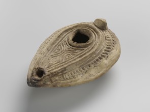 Oil lamp, Islamic art, Arabic culture; household ceramic oil lamp almond-shaped misbah zajti,