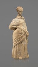 Terracotta figurine of a standing woman, terracotta, female figurine, himation, chiton, Tanagra