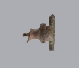 Brooch with a crossbar. Brooch with a bow made of a wide, slightly curved band decorated with