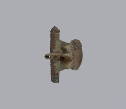 Brooch with a crossbar. Brooch with a bow made of a wide, slightly curved band decorated with