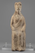 Female figurine, unknown creator/workshop, Female figure in a seated position, slightly leaning