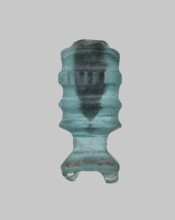 Cosmetic bottle, Islamic, Arabic culture. Thick-walled blue glass vessel with one convex band