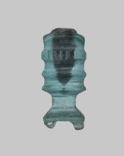 Cosmetic bottle, ; Islamic, Arabic culture; 9th–11th century, Egypt. Thick-walled blue glass