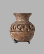 Cosmetic bottle. Spherical body decorated at the top with a zigzag pattern of applied glass thread.