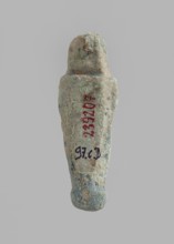 Ushabti. Carelessly made figurine with schematic facial features, in a narrow wig revealing the