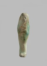 Ushabti, Mass-produced ushabti figurine with very schematic shapes, with a barely marked face and
