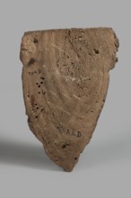 Sarcophagus mask with a partially preserved fragment of a wig above the forehead painted yellow