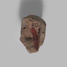 Head of a man. Fragment of a terracotta figurine showing the head of an elderly man. Thin face with