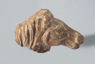 Head of a terracotta horse figurine. Terracotta. Head with part of the neck and mane of a horse;