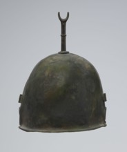 Bronze helmet, 4th–3rd century BC, Italy, armament; height 27 cm without cheek guards, width 19.8