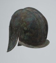 Bronze helmet, 550–500 BC, Italy, armament; height 24 cm, width 18.5 cm, depth 23.2 cm, weight 1