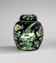Ginger vessel with lid, porcelain pot decorated with overglaze enamel paints on a black background;