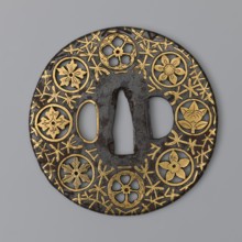 Crossguard tsuba, sword crossguard of maru gata round tsuba mon-sukashi type, decorated with eight