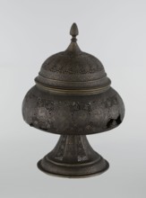 Censer, Persian, Qajar dynasty 1785–1925, 18th–19th century, Iran. Brass censer, height 33.0 cm,