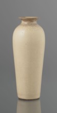 Cylindrical porcelain vase, tapering towards the bottom; flat rim. Light cream glaze with fine