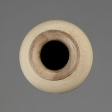 Cylindrical porcelain vase tapering toward the bottom with a flat rim; light cream glaze with fine