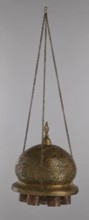 Lamp, 19th–20th century, Damascus, Syria. Metal oil lamp with cover decorated with a star motif;