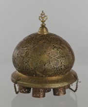 Lamp, Islamic art, Arabic culture; metal lighting vessel with geometric ornament and Arabic