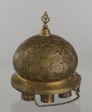 Lamp, Islamic art, Arabic culture; metal oil lamp with Arabic inscriptions and geometric ornament;
