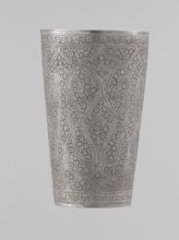 Mug, Mughal period, 19th century, North India probable. Silver mug densely decorated with plant and