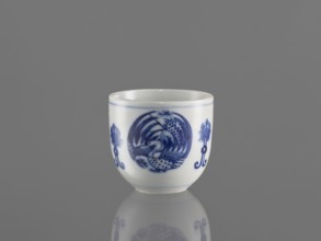 Bowl, ceramics, decorated with three phoenix images and stylized lotus flowers; blue-and-white
