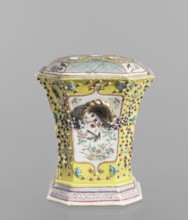 Vase with a lid; ceramics, colored porcelain; openwork, flat perforated lid; decorated with