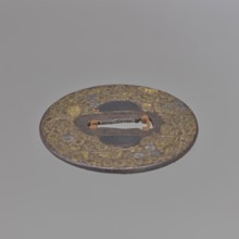 Crossguard tsuba, Mino school, Japanese, Edo period 18th century. Iron round tsuba maru gata with