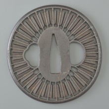 Crossguard tsuba, Tsunetada maker, Japanese, Edo period 19th century. Round tsuba maru-gata with a