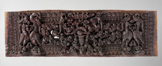 Decorative panel;, wooden panel likely originally a decorative element, part of home furniture or a