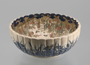 Deep bowl on a low ring-shaped base with a knobbed body and serrated rim, reminiscent of a