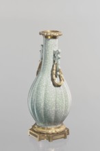 Vase, Chinese, Qing dynasty 1644–1911, 19th century. Celadon ceramic slender vase with long neck