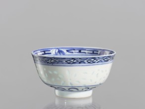 Bowl, Chinese, Qing dynasty 1644–1911, 18th–19th century. Blue-and-white porcelain bowl on a low