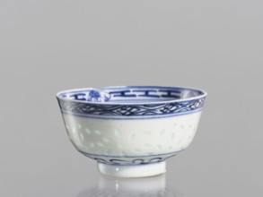 Bowl, Chinese, Qing dynasty 1644–1911, 18th–19th century. Blue-and-white porcelain bowl on a low