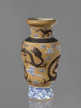 Vase, Chinese, 19th century. Steam vase; ovoid; short, slightly flared foot; pear-shaped belly;