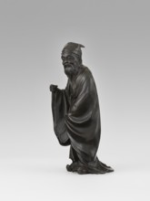 Sage, unknown sculptor; figurine of a Chinese sage man, scholar wearing a long flowing robe and a