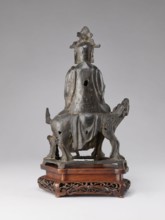 Buddhist deity on a buffalo on a base; bronze sculpture, Chinese, Qing 1644–1911, 19th century;
