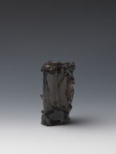 Vase on base, carved ornaments, flowers and birds decorative motifs, stylized rock carving; wooden