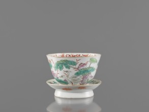 Bowl with stand, ceramics. Colored porcelain bowl decorated with lotuses; stand decorated inside