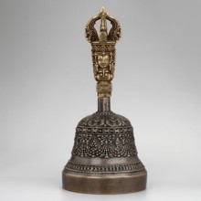 Bowl with a lambrequin border with mascarons. Handle with a bust of a Bodhisattva carrying a vajra.