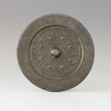 Mirror with TLV decoration on a pedestal in the form of a qilin on a base. Chinese, Qing dynasty
