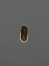 String threading knob kurigata, Japanese, katana scabbard decorative element; depicts deer, leaves,