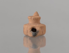Oil lamp, Fatimid dynasty 909–1171, 12th century, Egypt; Islamic/Arabic pottery; Egyptian utility