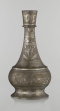 Bottle, Islamic art, Arabic culture, geometric and plant motifs, neck slender toward the top ending